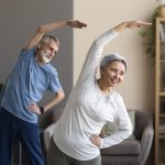 senior-couple-exercising-at-home